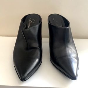 Delman Black leather shoes with metal heels.